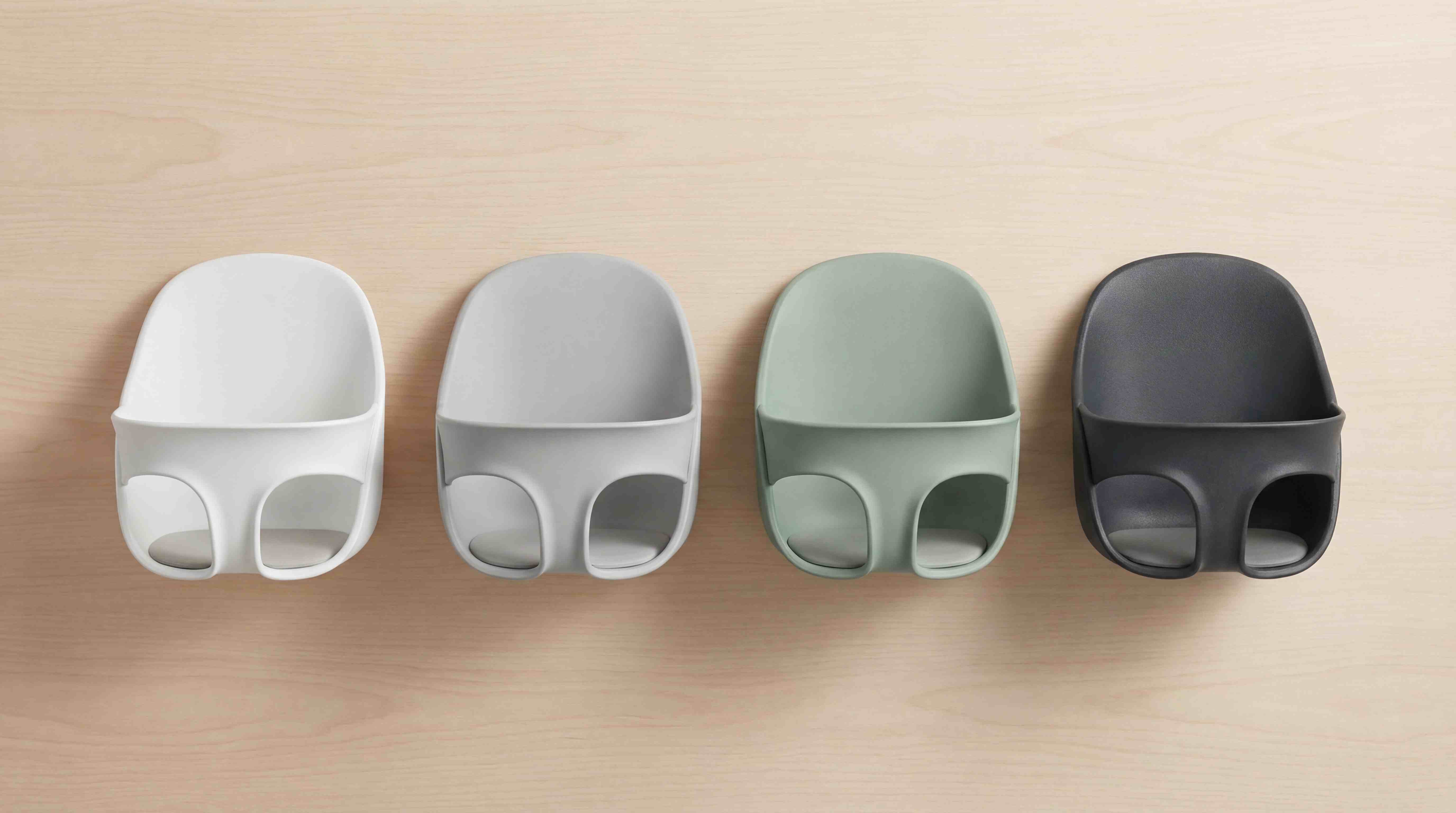 Baby Keep in four color options: white, light gray, sage green, and charcoal